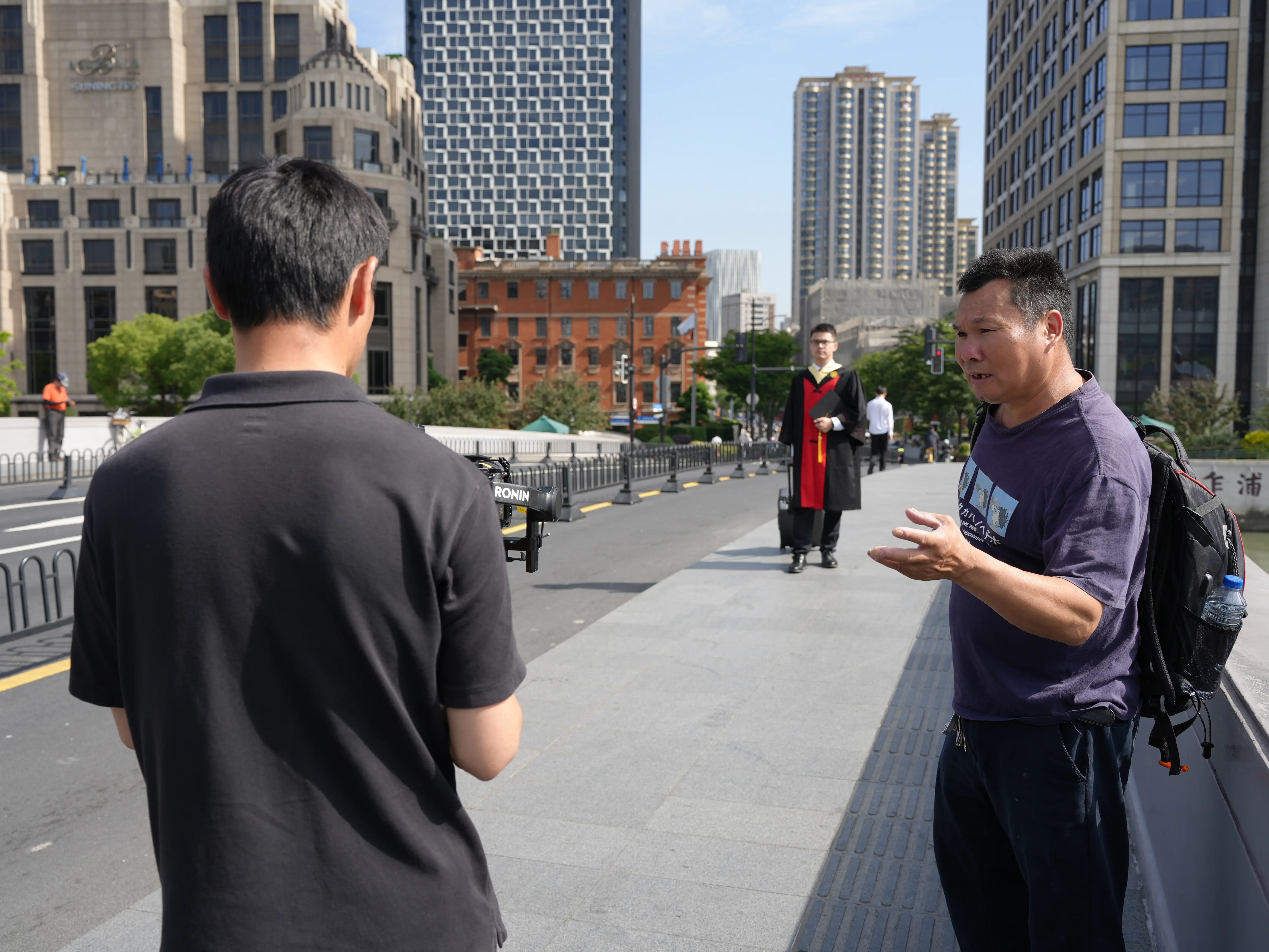 Filming team on Zhapu Road Bridge