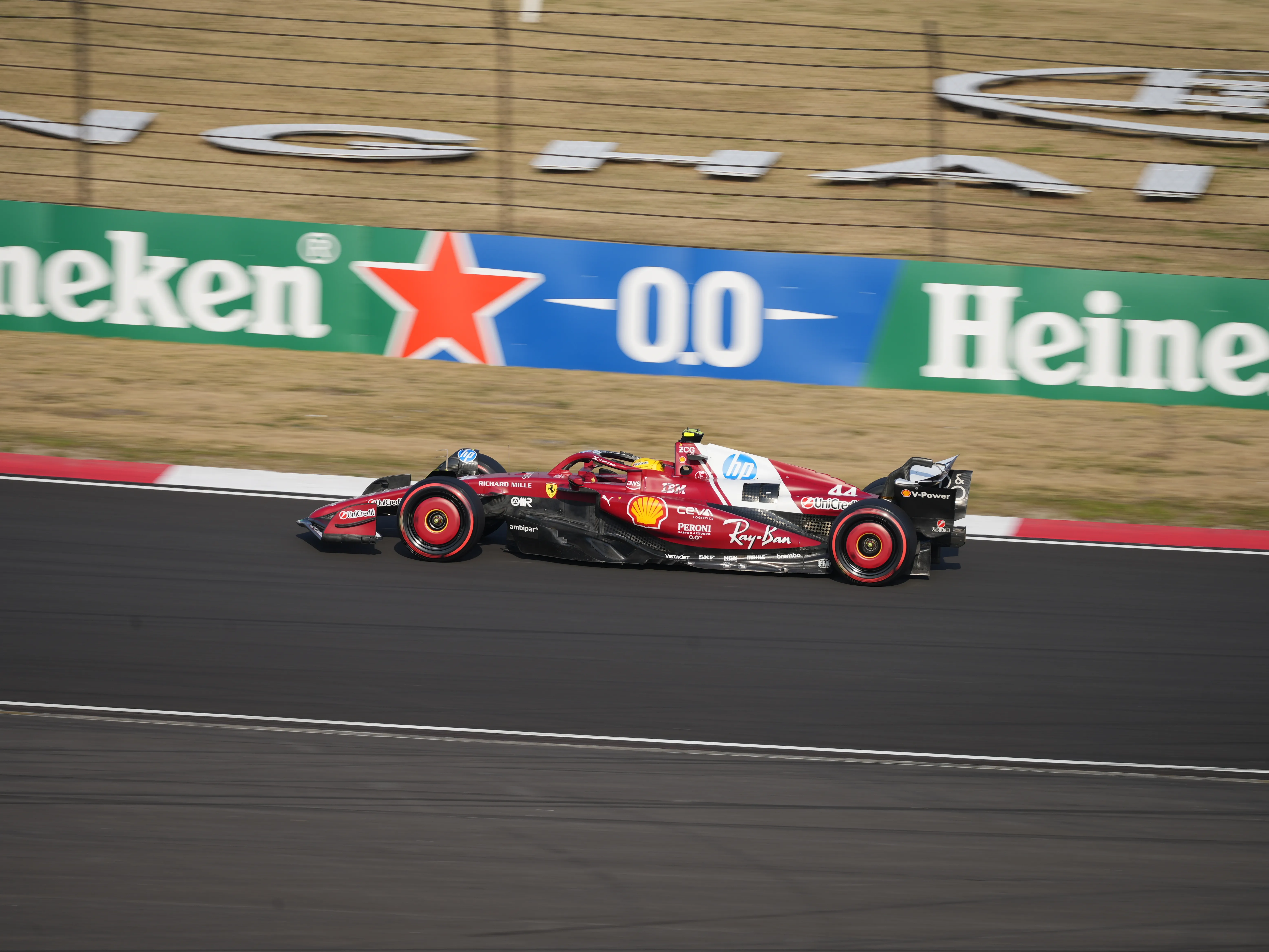 Lewis Hamilton driving a Ferrari SF-25 in the Shanghai Circuit